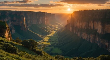 Wall Mural - golden sunset over majestic cliffs illuminating a serene valley with deep shadows and expansive copy