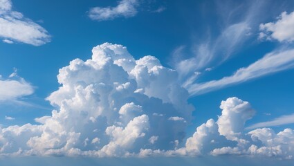 Wall Mural - bright blue sky with fluffy white clouds showcasing a serene and vibrant atmosphere ideal for outdoo