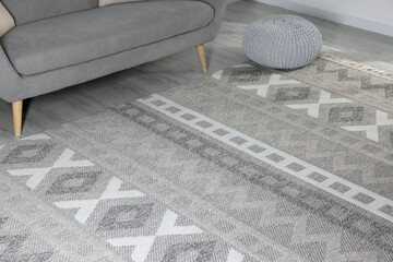 Wall Mural - Stylish soft rug with pattern on floor in living room