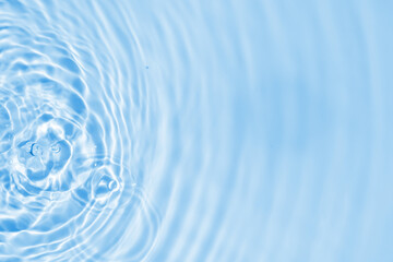 Wall Mural - abstract transparent water shadow surface texture natural ripple on blue background