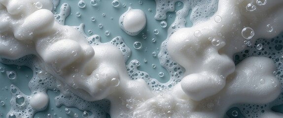 Wall Mural - abstract close-up of white foam and bubbles on a blue surface creating a serene and artistic backgro