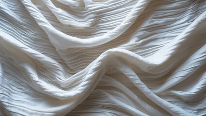 Wall Mural - elegant white fabric with soft waves and folds creating a delicate and textured background ideal for