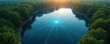 © Viktor - Aerial view of forest lake features digital network overlay. Tech integrates with nature creating serene, tranquil scenic ecosystem. Modern concept shows harmony, connection, data visualisation of