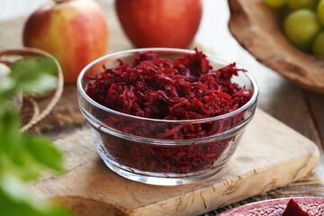 Wall Mural - Red beetrood salad in a glass bowl