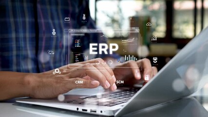 Fototapete - Close-up of hands typing on a laptop keyboard with a futuristic digital interface displaying ERP (Enterprise Resource Planning) system, analytics, and business management icons.