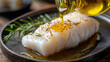 © Sajib - baked cod fillet with rosemary and olive oil drizzle fish food meal herb dish plate tasty
