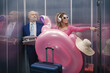 © stokkete - Rude tourist carrying a huge inflatable toy in the lift