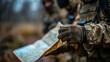 © Prostock-studio - Troops closely examine a map while strategizing their next move in a woodland area. The focus is on teamwork and navigation skills while adjusting to challenging conditions.