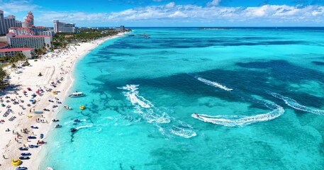 Wall Mural - aerial view of the public beach at goodmans bay, nassau, bahamas, with water sports and turquoise oc
