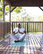 © Wavebreak Media - Senior man meditating on yoga mat outdoors, enjoying peaceful nature setting, copy space