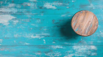 Fototapete - Wooden circular object on a textured turquoise background