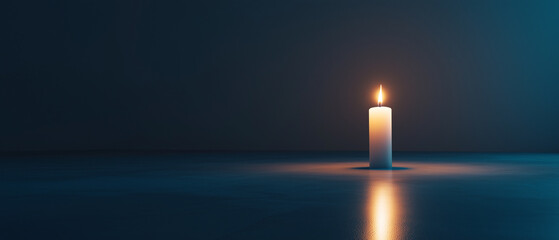 Poster - single candle glows warmly in dark minimalist room, casting soft reflection on smooth surface. serene ambiance highlights simplicity and tranquility of scene