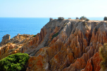 Wall Mural - walking path with breathtaking views through the coast from porches to benagil caves lagoa algarve portugal