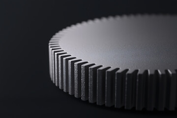 Wall Mural - close-up of a metal gear with visible teeth, showcasing precision engineering against a dark backdro