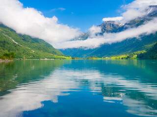 Wall Mural - mountain lake in norway. nature in fjords. high mountains and reflections on the surface of the wate