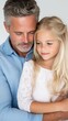 © imagineRbc - A father embraces his daughter in a warm, affectionate moment. They share a peaceful connection, enjoying each other's company in a softly lit indoor setting