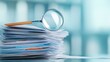 © CrazyJuke - A detailed document analysis concept featuring a magnifying glass over a stack of papers in an office setting for audits.