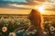 © Milos - Woman enjoys sunset in a field of wildflowers while a gentle breeze flows through her hair