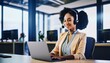 © SSuperTier - Vibrant and professional American customer care representative is seen smiling warmly while wearing a sleek headset in a modern office setting.