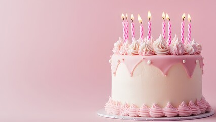 elegant pink birthday cake with lit candles and whipped cream frosting – perfect celebration cake