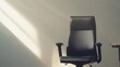 © bussi - Executive departures with an empty office chair in front of a desk. Featuring leadership change and opportunity