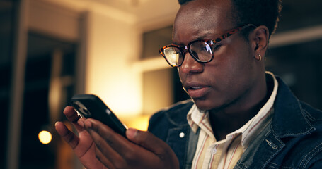 Poster - Bad news, face and phone with business black man closeup in office at night for deadline or overtime. Grief, sad or stress with unhappy employee at workplace in evening for mobile communication