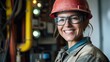 © Selvi - Smiling Female Engineer in Industrial Setting