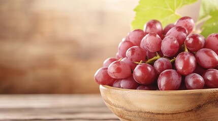 Poster - Fresh and Juicy Red Grapes Arranged in a Wooden Bowl with Green Leaves : Generative AI