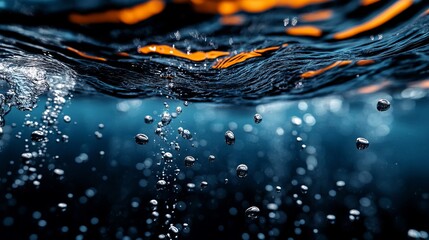 Wall Mural - Water droplets on the surface of a blue ocean