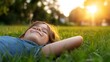 © Generative AI - Happy Girl Relaxing in the Grass Under a Warm Golden Sunset Sky Enjoying Nature's Beauty : Generative AI