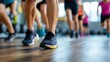 © Generative AI - Closeup of feet of athletes running swiftly on gym floor during highenergy workout class : Generative AI
