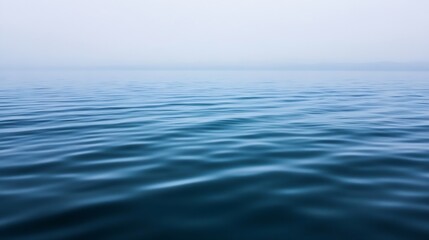 Poster - Smooth and serene water surface with gentle waves reflecting a soft overcast sky : Generative AI