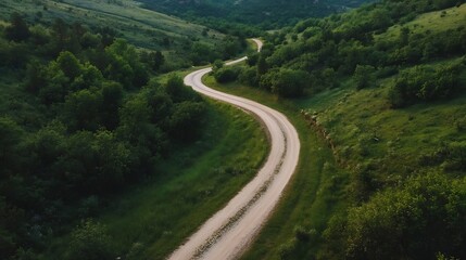 Aufkleber - Serene Winding Country Road Surrounded by Lush Green Hills : Generative AI