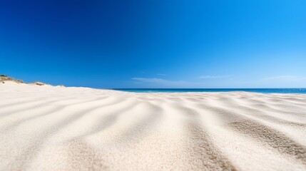 Poster - Stunning sandy beach with clear blue sky and calm ocean view creating a serene coastal landscape : Generative AI