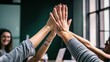 © Ruslan - Colleagues in the office share a joyous moment after a successful meeting. They celebrate their teamwork and the accomplishment of their shared goal with a high five.