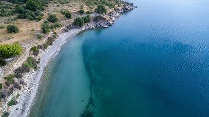 Canvas Print - Aerial view of tranquil coastline with pristine blue waters and sandy shoreline : Generative AI