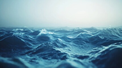 Naklejka na meble The ocean is calm and peaceful, with only a few small waves breaking on the shore. The water is a deep blue color, and the sky is a light blue color. The scene is serene and tranquil