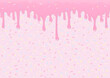 © Jenjira - Pink icing with pastel sugar sprinkles background