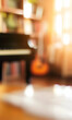 © Lucianastudio - Dreamy music room scene with blurred piano, guitar, and books bathed in soft, warm light