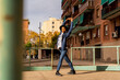 © VISTA by Westend61 - Young man moving and dancing outdoors
