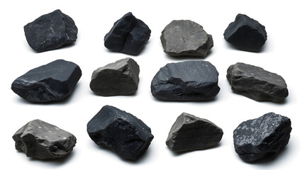 Leinwandbilder - a collection of various dark rocks and stones on the ground 