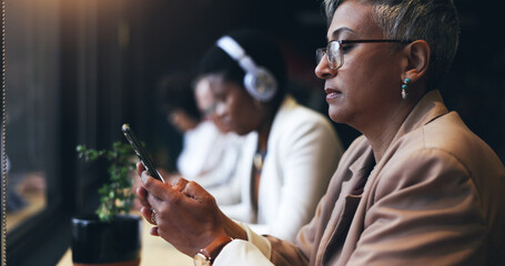 Aufkleber - Face, phone and a business woman in a coffee shop while reading a text message for communication. Mobile, networking and cafe with a mature employee typing in a restaurant for a break from work