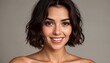 © KarpenArt Studio - A portrait of a young woman with a short dark hair cut and bare shoulders.