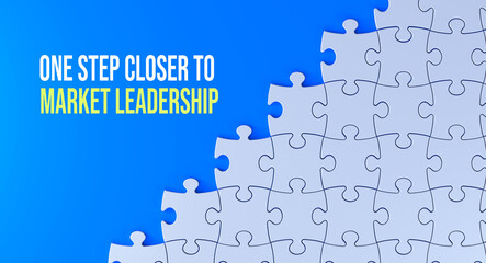 Wall Mural - One step closer to market leadership text message on jigsaw puzzle. Blue background and word banner concept