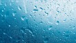© mbah - Condensation droplets on blue glass, blurred background, texture