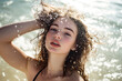 © Christopher - young woman in water