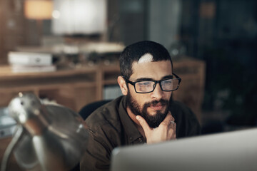 Fototapete - Overtime, man or graphic designer reading on computer in startup for online layout update or creative project. Late night, technology or person in media agency for homepage ideas, news or development