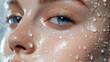 A close-up of a model's smooth skin with water droplets symbolizing deep hydration