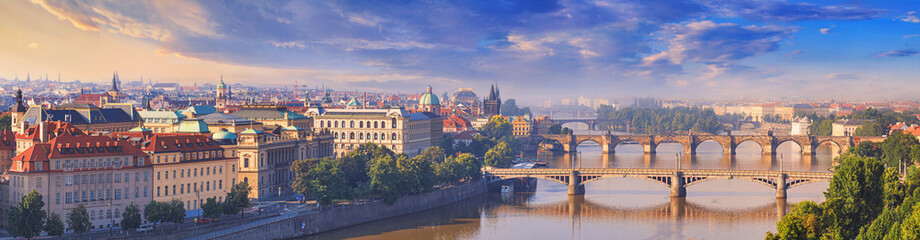 Wall Mural - City summer landscape, panorama, banner - top view of the historical center of Prague with the Vltava river and bridges, Czech Republic