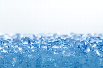 Aufkleber - Clear blue gel beads reflecting light on a smooth surface during daytime. Generative AI